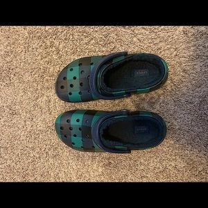 Green and black plaid fuzzy crocs